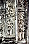 Angkor Wat temple, the fourth enclosure, the bas reliefs of the west gopura, superbly preserved devatas, either individually or in groups of two or three, amongst the finest in the monument. 